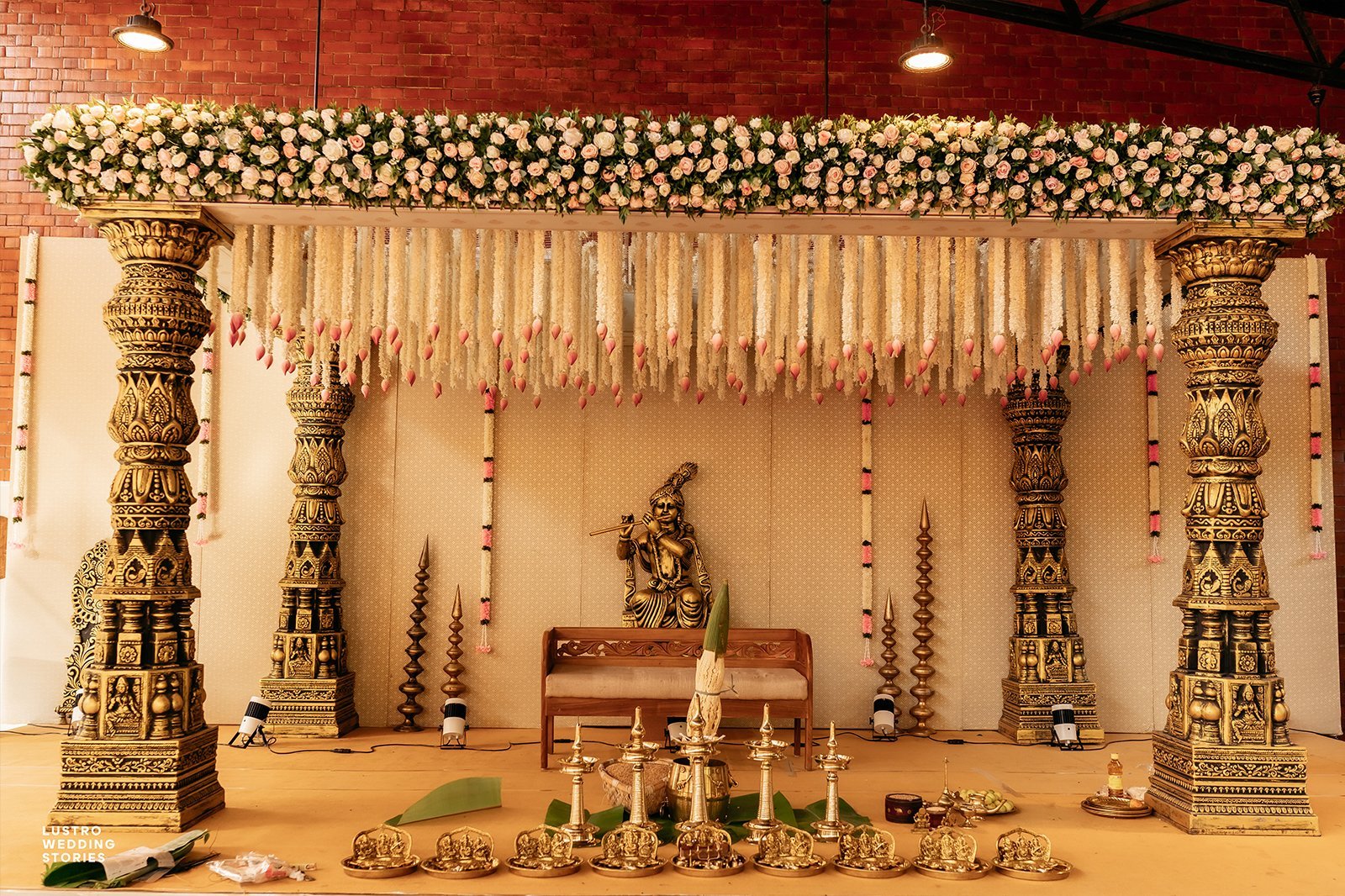 Guruvayur Temple Wedding - Beautifully decorated mandap with floral arrangements and traditional Kerala wedding stage setup for Guruvayur temple marriage