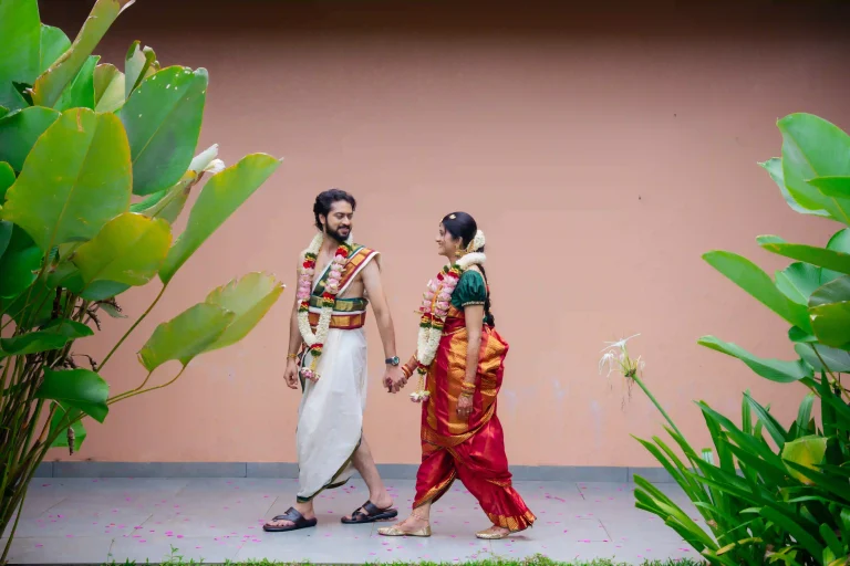 a luxury wedding in guruvayur frame groom and bride walking